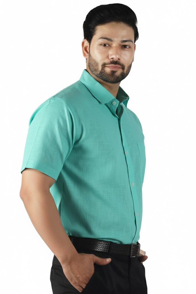 Elegant green half sleeve linen shirt for men, natural linen texture with a premium minimalist fit.
