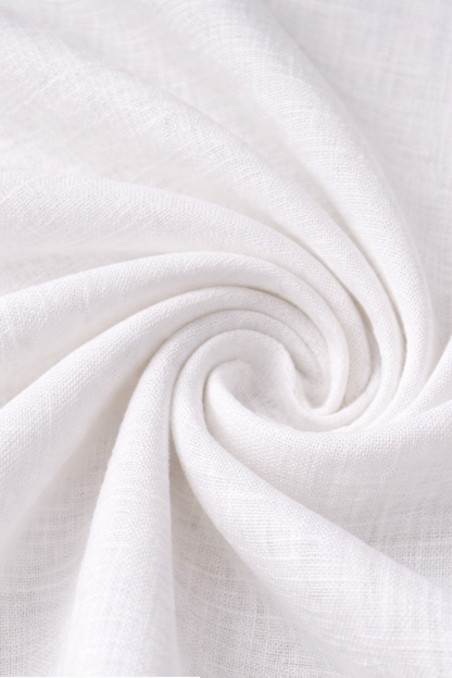 Pure white linen fabric with a close-up inset showing folded white sheets.