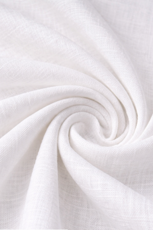 Pure white linen fabric with a close-up inset showing folded white sheets.